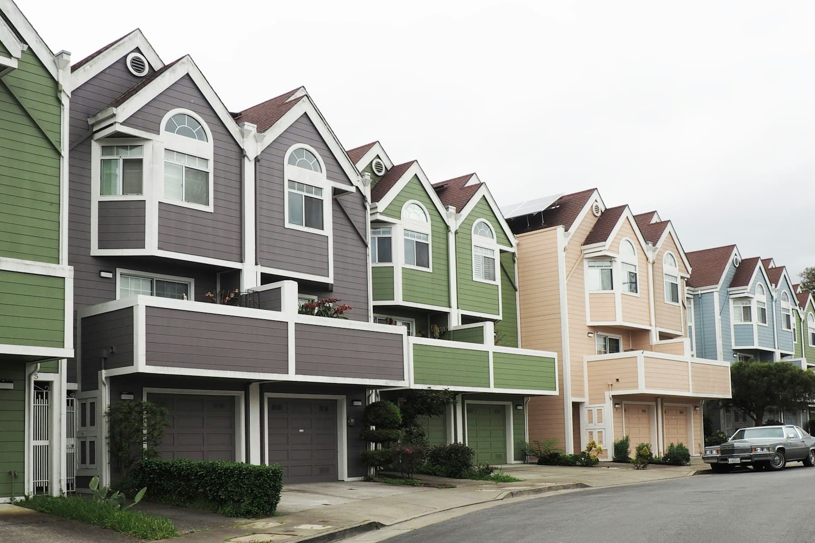 Row of townhouses along a residential street in a planned community